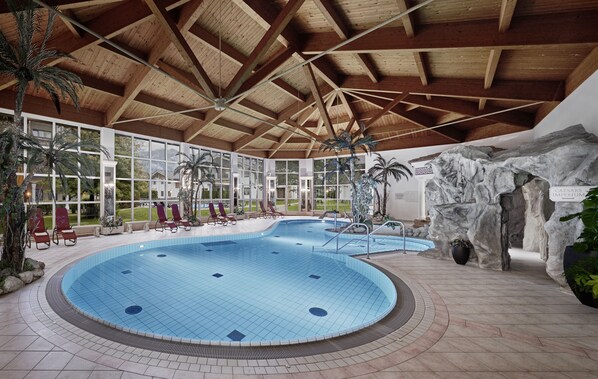 Indoor pool, seasonal outdoor pool, pool umbrellas, pool loungers
