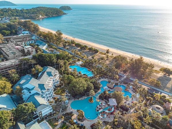 Beach nearby, white sand, beach towels