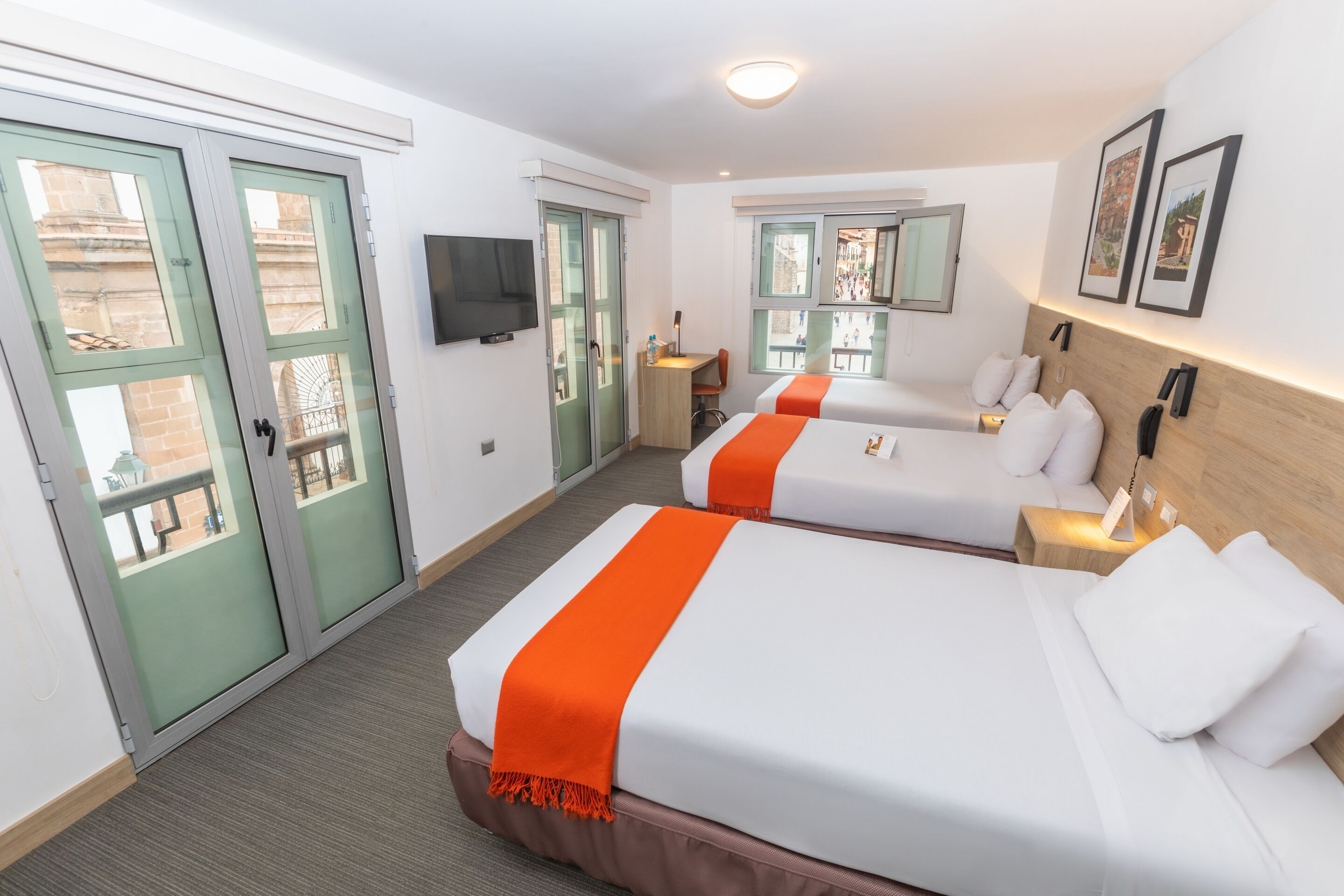 traditional room, 3 single beds, city view | down duvets, in-room safe, desk, free cots/infant beds