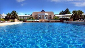 Indoor pool, outdoor pool, pool umbrellas