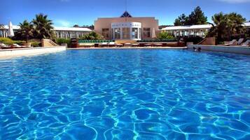 Indoor pool, outdoor pool, pool umbrellas
