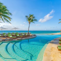 5 outdoor pools, open 7:00 AM to 7:00 PM, cabanas (surcharge)