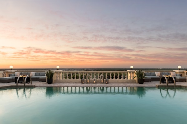 11 outdoor pools, open 8:00 AM to 11:00 PM, pool umbrellas, sun loungers