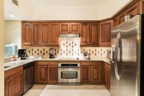 ONE BEDROOM GRANDE SUITE | Private kitchen | Fridge, microwave, oven, stovetop