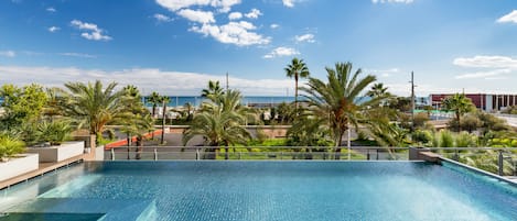 Seasonal outdoor pool, pool loungers