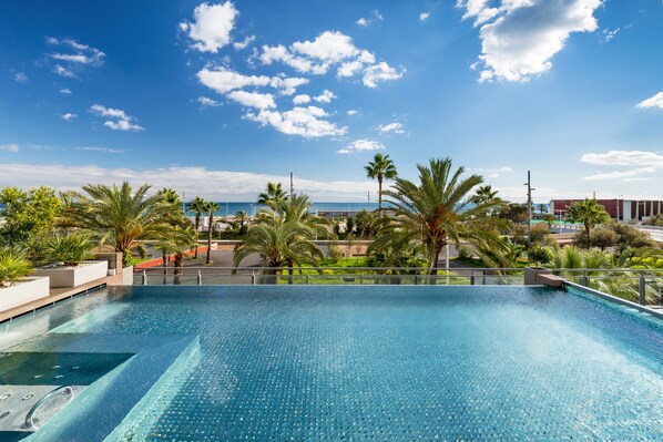 Seasonal outdoor pool, sun loungers