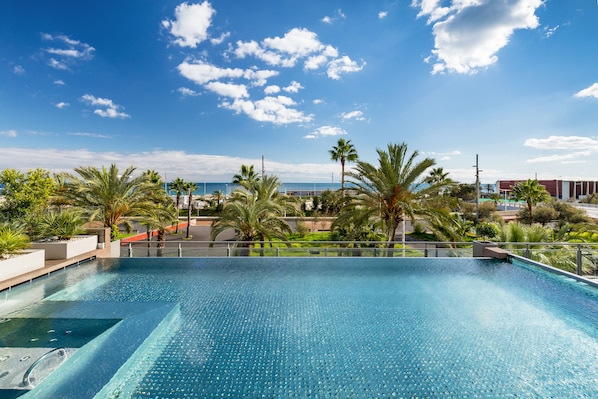 Seasonal outdoor pool, sun loungers