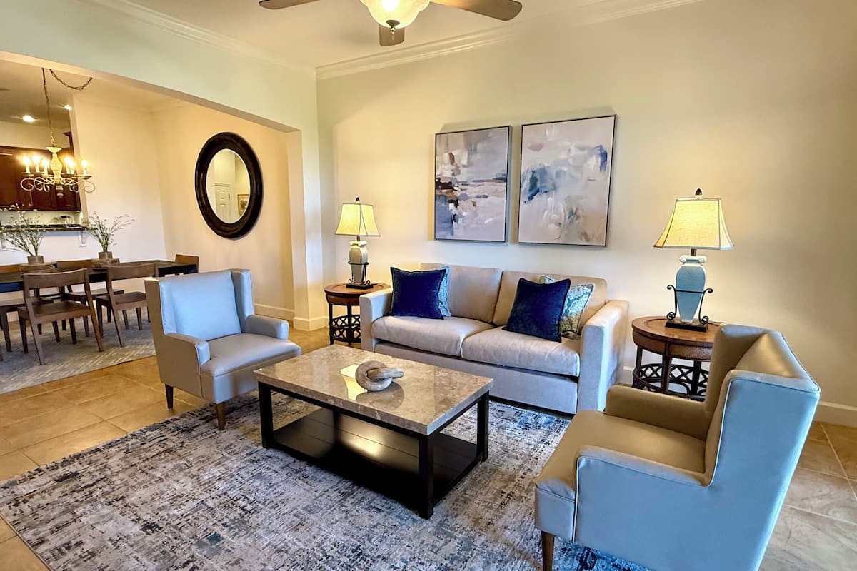 Condo, 3 Bedrooms, Ocean View (Cinnamon Beach) | Living area | 27-inch TV with digital channels, DVD player