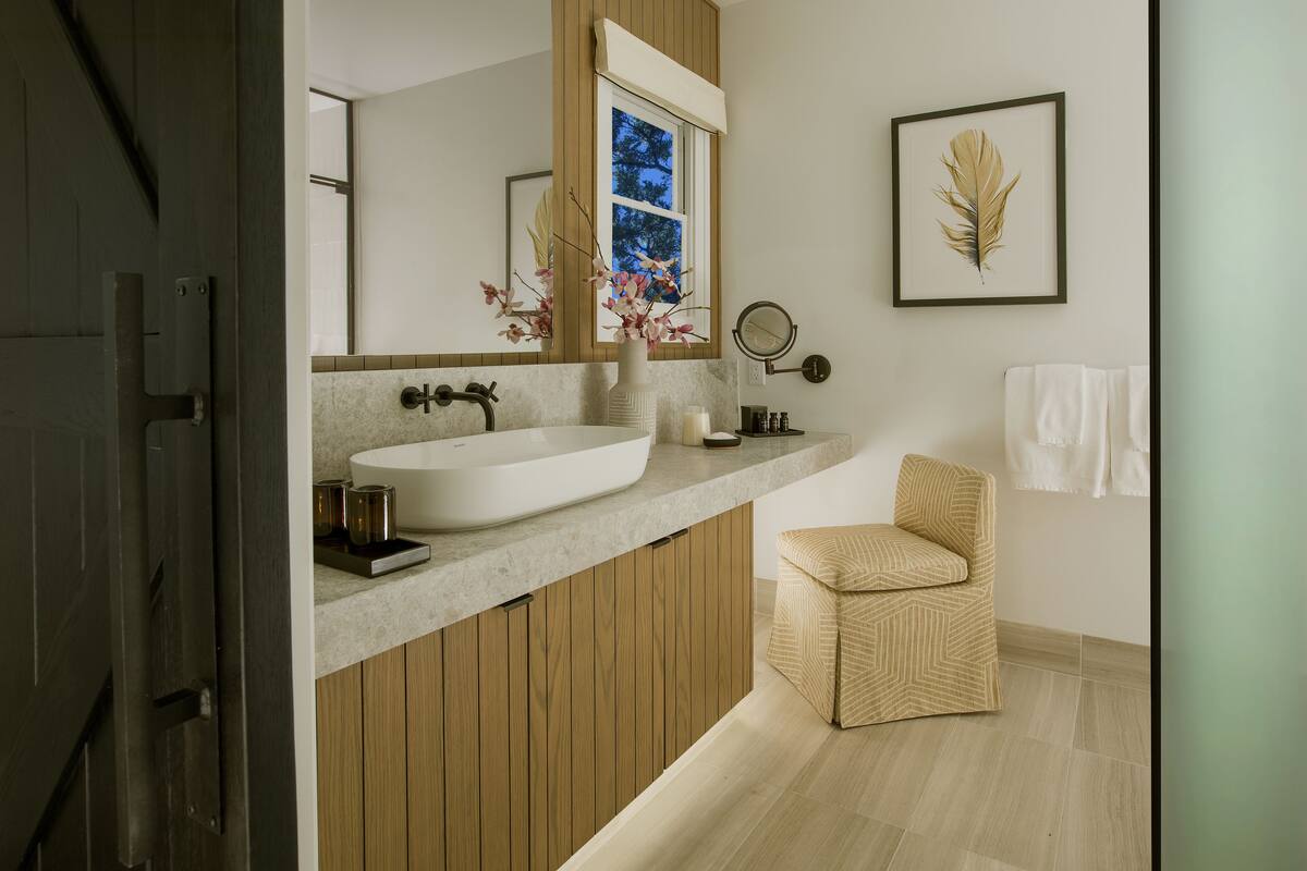 designer toiletries, hair dryer, bathrobes, slippers