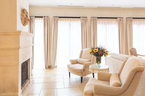 Flat-screen TV, DVD player, pay movies, offices