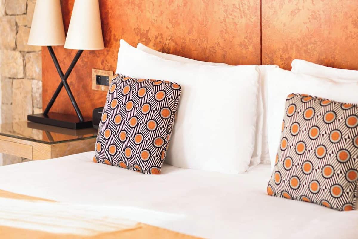 Premium bedding, pillow-top beds, minibar, in-room safe