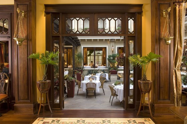 Breakfast, lunch, dinner served; international cuisine, garden views 