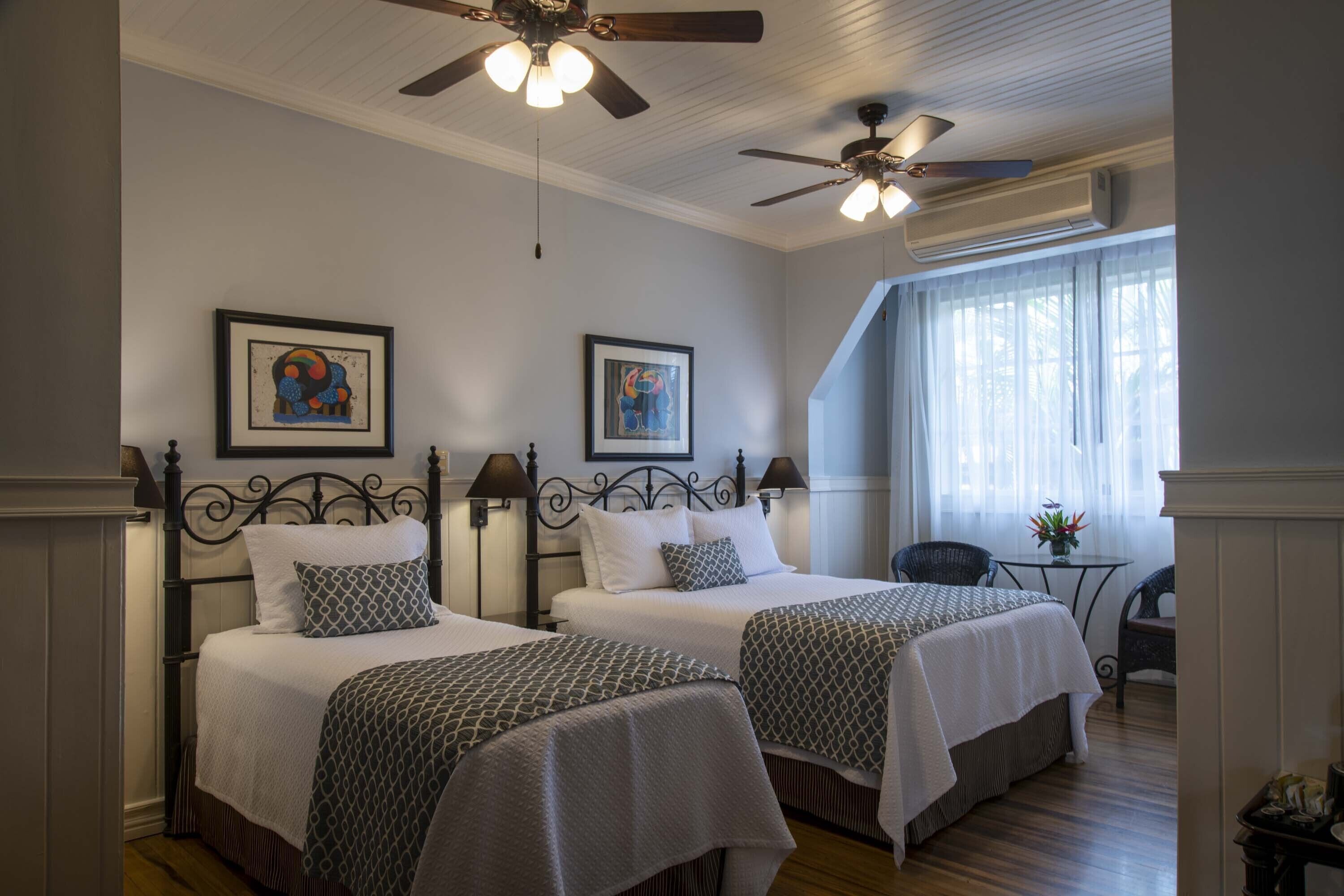 family suite, multiple beds | premium bedding, pillow-top beds, minibar, in-room safe