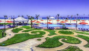 Seasonal outdoor pool, pool umbrellas, pool loungers
