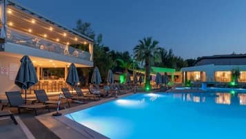 Seasonal outdoor pool, pool umbrellas, pool loungers