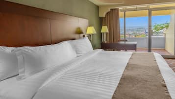 King Room with Balcony | Premium bedding, in-room safe, desk, iron/ironing board