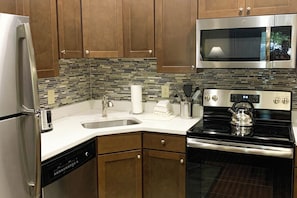 Superior Apartment, 2 Bedrooms, Kitchenette | Private kitchen | Full-size fridge, microwave, dishwasher, coffee/tea maker