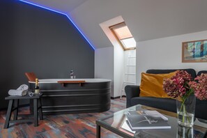 Junior Studio Suite | Bathroom | Designer toiletries, hair dryer, bathrobes, towels