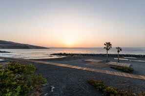 Beach nearby, black sand, scuba diving
