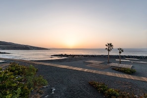 Beach nearby, black sand, scuba diving