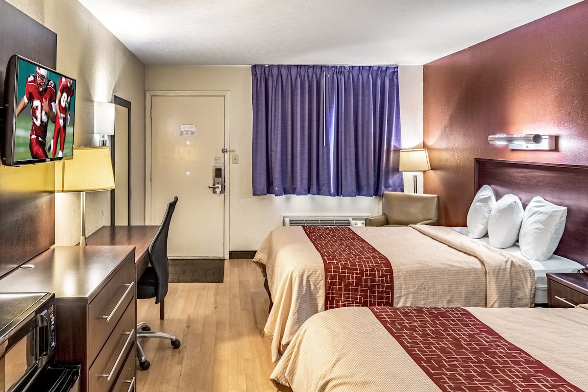 Deluxe Room, 2 Queen Beds, Non Smoking | 1 bedroom, blackout curtains, iron/ironing board, free cots/infant beds