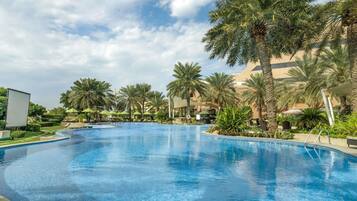 Outdoor pool, pool umbrellas, pool loungers