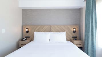 Standard Suite, 1 King Bed with Sofa bed, Kitchenette | Desk, laptop workspace, blackout drapes, iron/ironing board