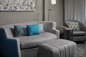 Suite, 1 Bedroom | Living area | 32-inch TV with cable channels