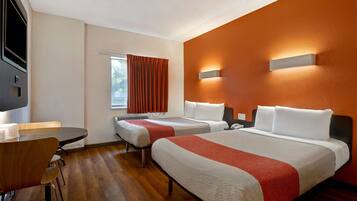 Desk, blackout curtains, free WiFi, bed sheets