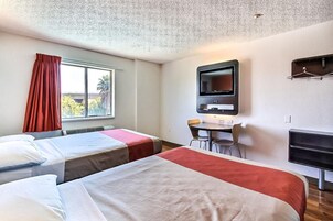 Desk, blackout drapes, free WiFi, bed sheets