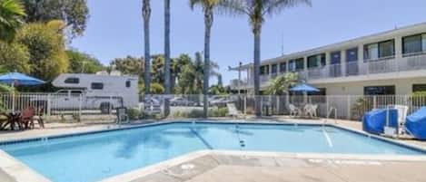 Outdoor pool, pool umbrellas, sun loungers