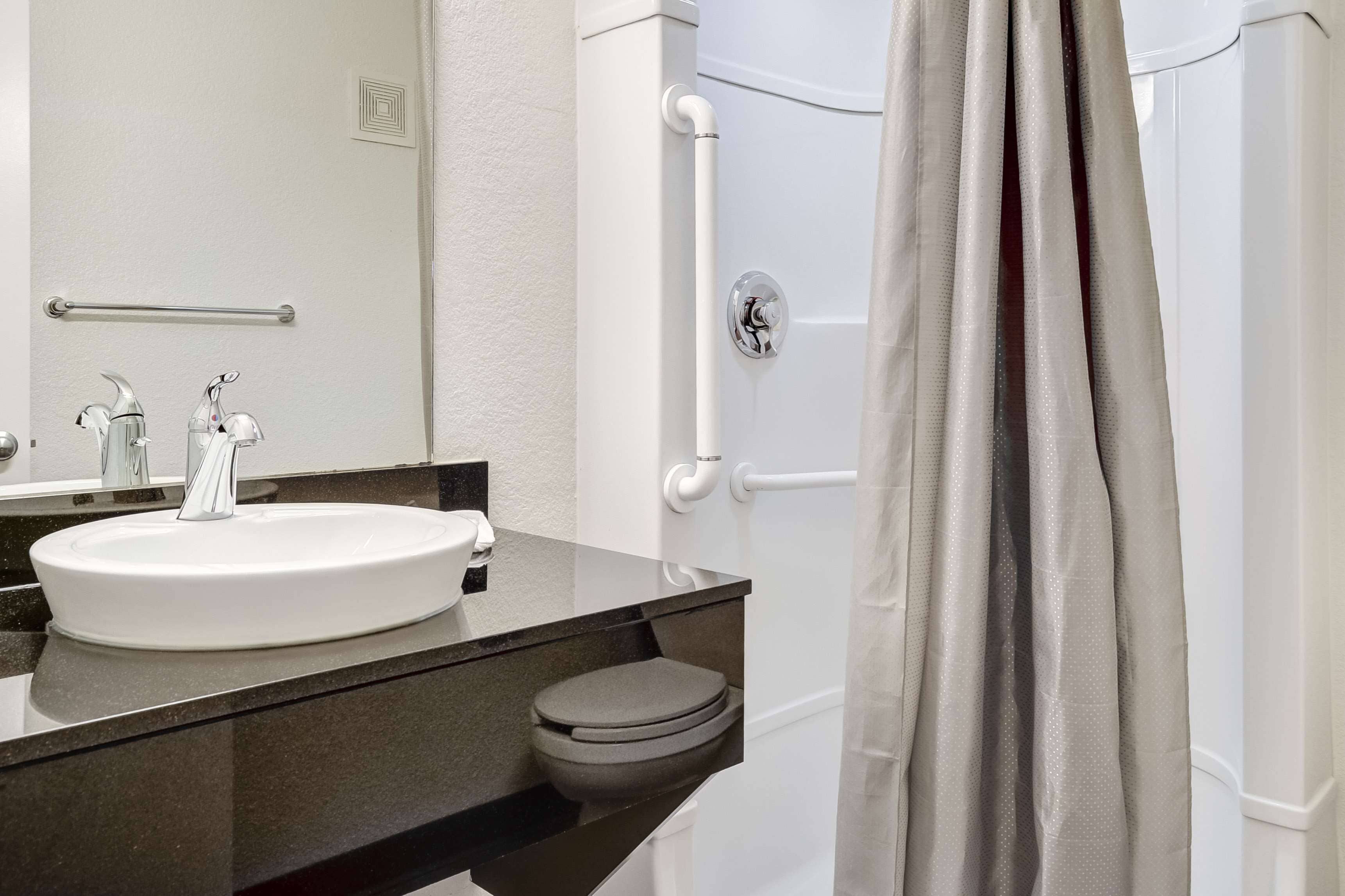 Shower, towels, toilet paper