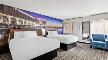 Premium bedding, down comforters, pillowtop beds, laptop workspace