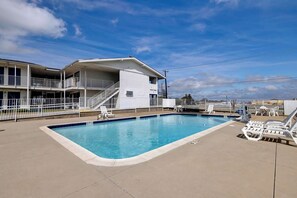 Outdoor pool, open 9:30 AM to 9:30 PM, pool loungers