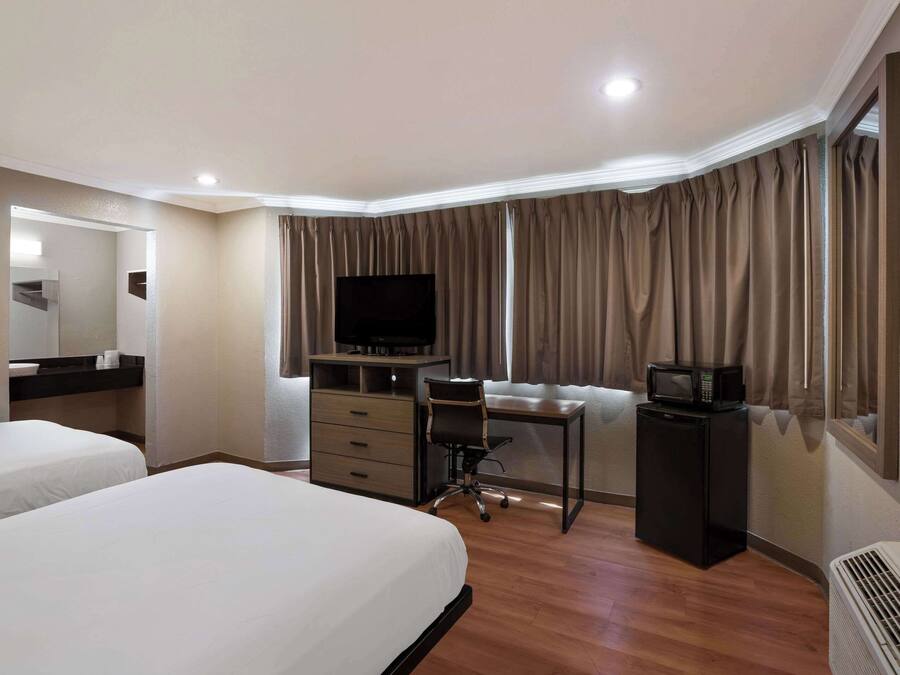 Desk, blackout drapes, free cribs/infant beds, free WiFi