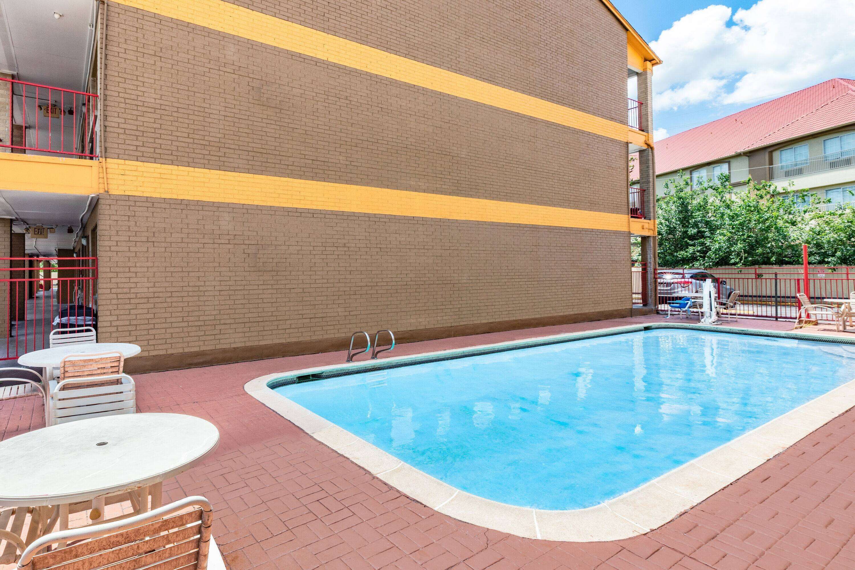 outdoor pool, pool umbrellas, pool loungers