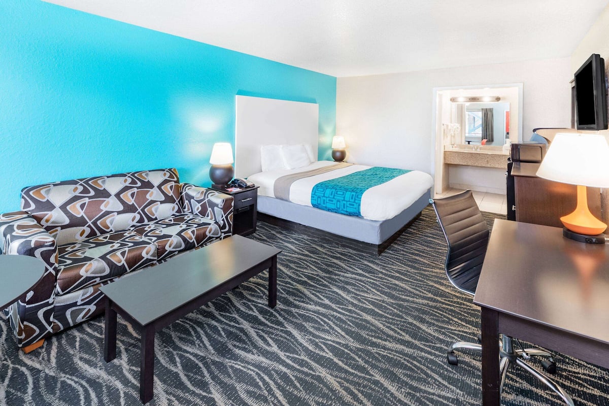 pillow-top beds, desk, laptop workspace, iron/ironing board