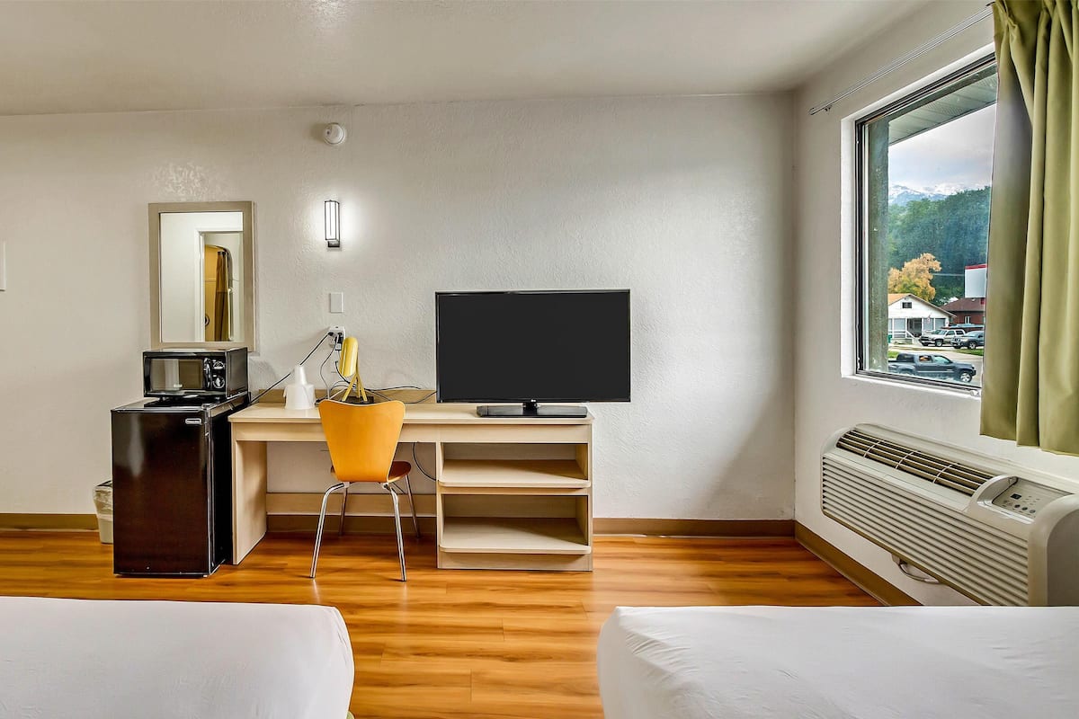 Individually furnished, desk, laptop workspace, blackout drapes