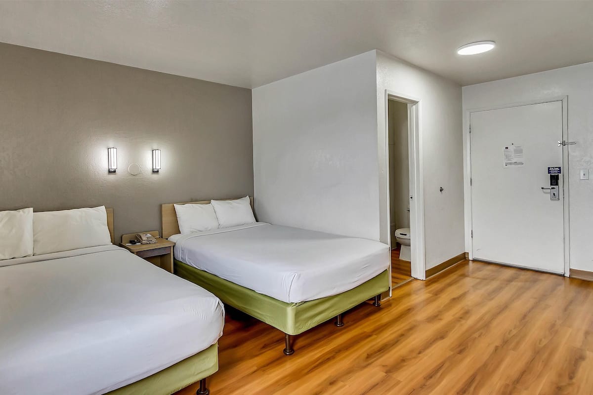 Standard Room, 2 Double Beds, Non Smoking | Individually furnished, desk, laptop workspace, blackout drapes