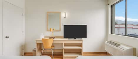 Individually furnished, desk, laptop workspace, blackout curtains