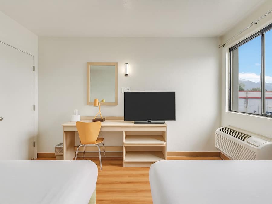 Individually furnished, desk, laptop workspace, blackout curtains