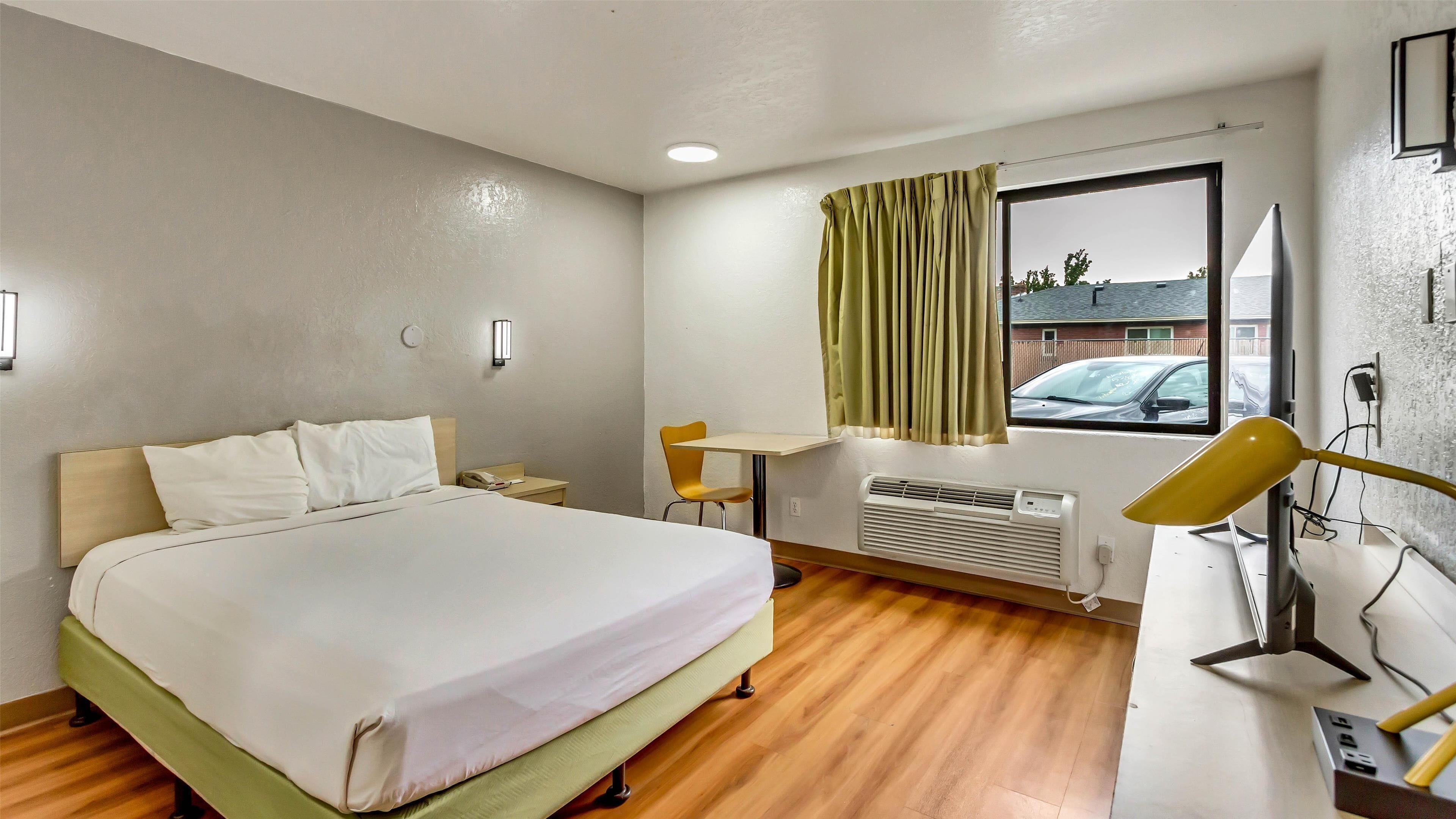 Individually furnished, desk, laptop workspace, blackout drapes