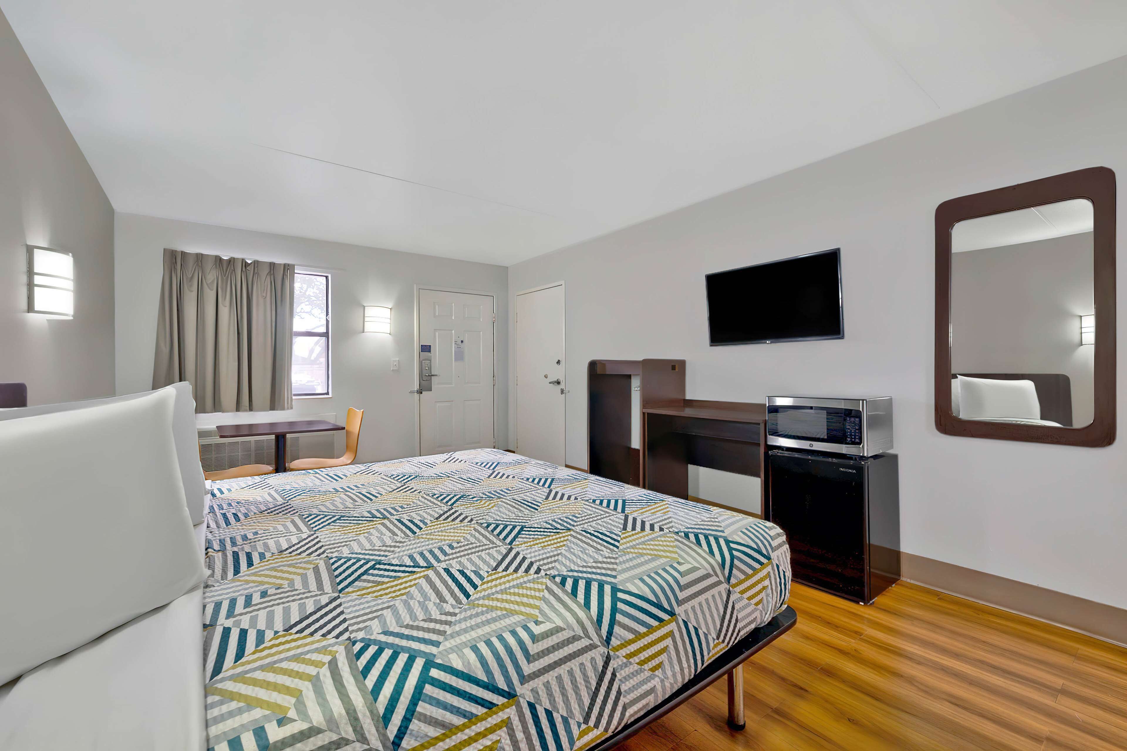 Desk, laptop workspace, free WiFi, bed sheets