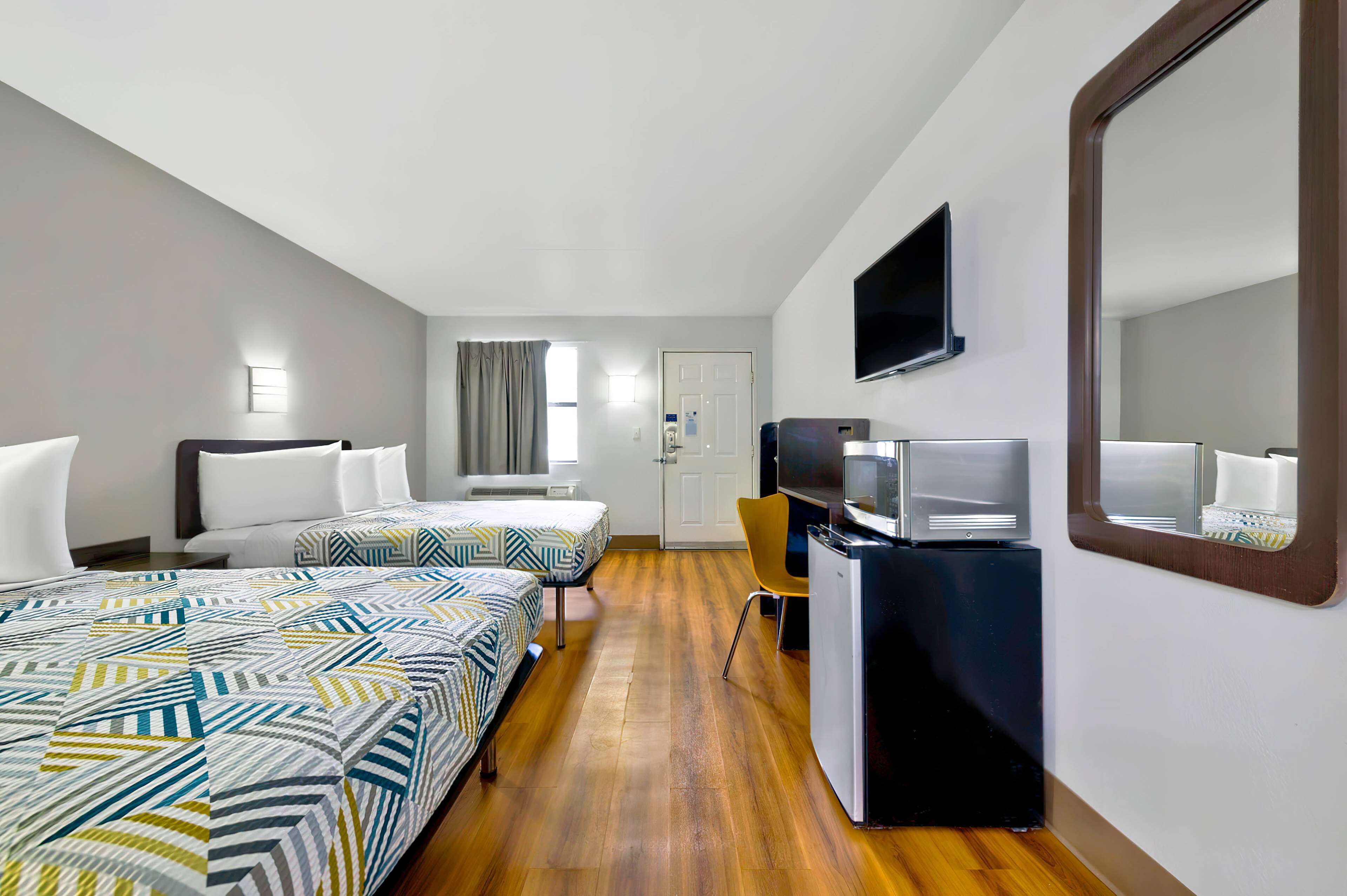 Desk, laptop workspace, free WiFi, bed sheets