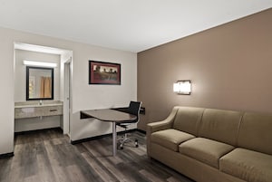 Desk, blackout drapes, free WiFi, bed sheets