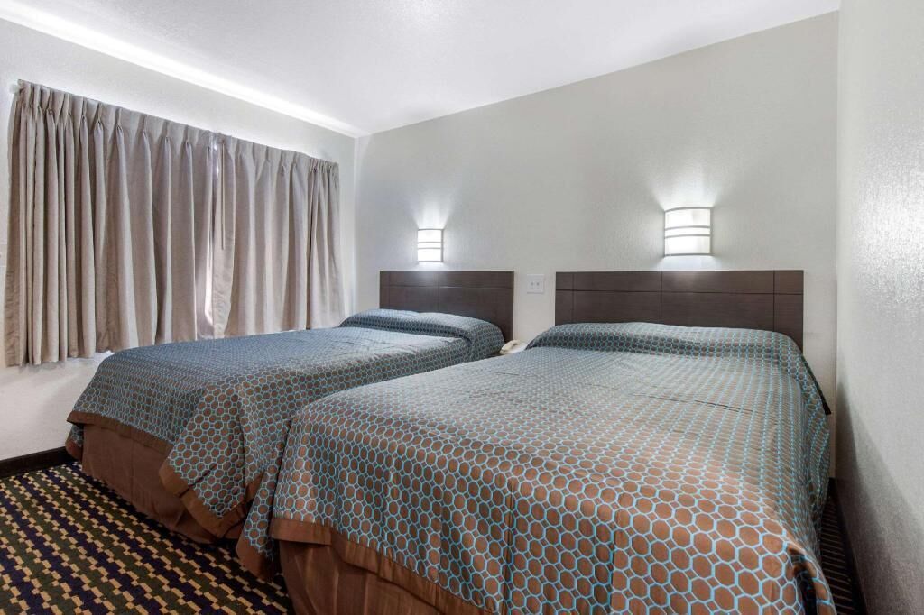 Desk, blackout curtains, free WiFi, bed sheets