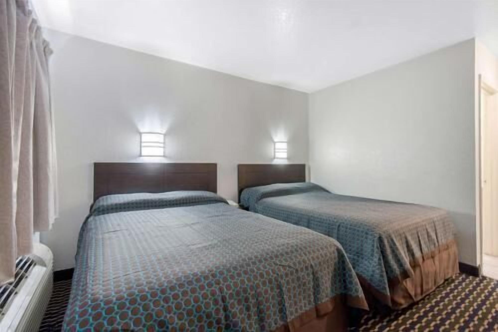 Desk, blackout curtains, free WiFi, bed sheets