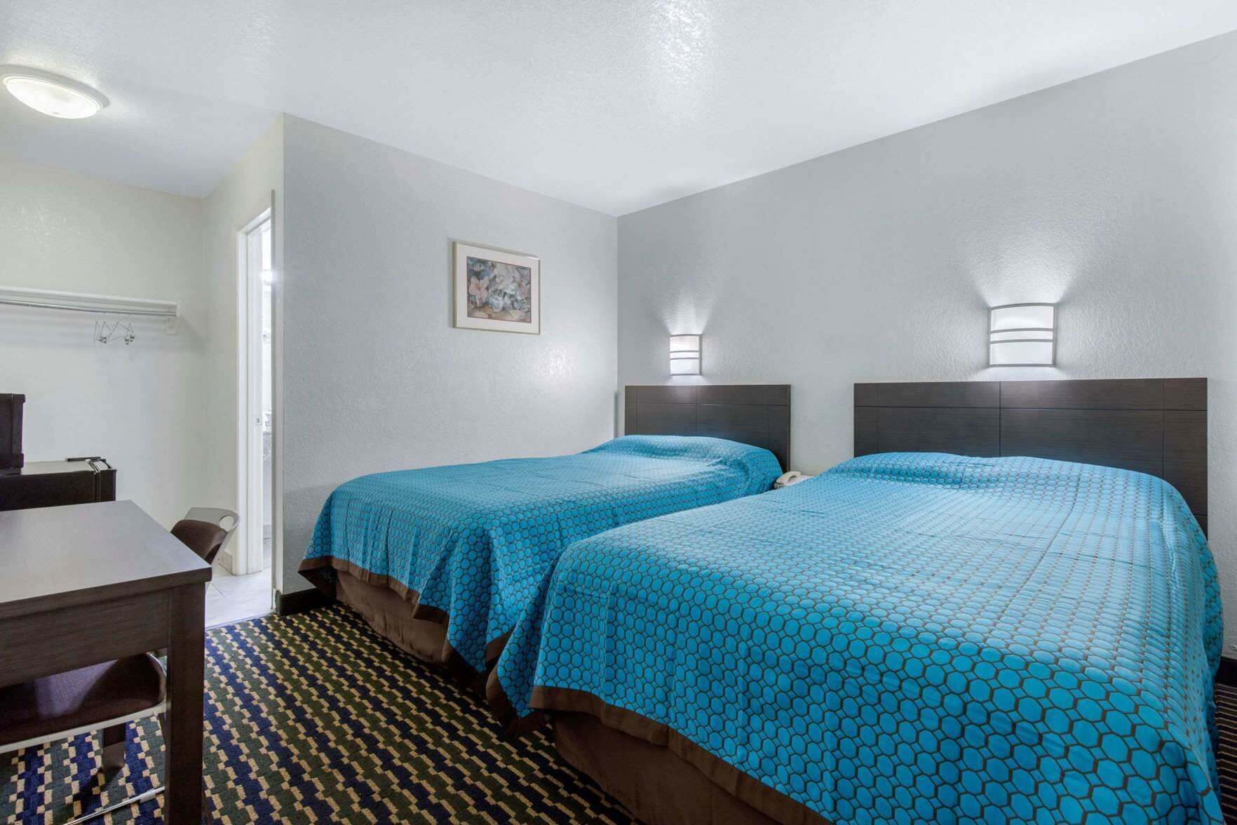 Desk, blackout curtains, free WiFi, bed sheets