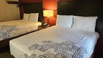 Rideaux occultants, chambres insonorisées, fer et planche à repasser