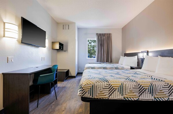 Desk, laptop workspace, blackout curtains, free WiFi